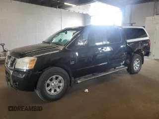 2004 Nissan Titan LE with VIN 1N6AA07B04N544755, listed as a Copart auction lot 59580975 with 153,024 mi miles and Salvage title. Bid and sale history available at DreamBid. Image 1.