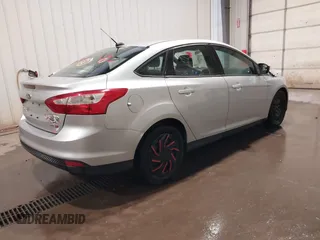2012 Ford Focus SE with VIN 1FAHP3F21CL284921, listed as a IAAI auction lot 42054351 with 164,377 mi miles and . Bid and sale history available at carsss.com. Image 4.