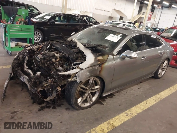 2014 Audi S7 Prestige with VIN WAUW2AFC5EN012180, listed as a IAAI auction lot 40895822 with 1 mi miles. Bid and sale history available at carsss.com. Image 2.
