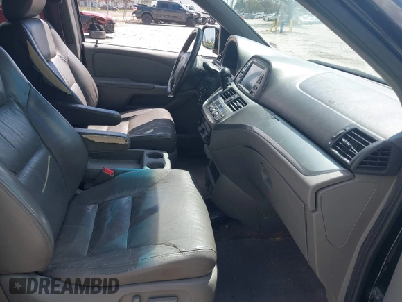 2010 Honda Odyssey EX-L with VIN 5FNRL3H79AB028724, listed as a IAAI auction lot 41687998 with 221,852 mi miles. Bid and sale history available at carsss.com. Image 5.