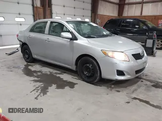 2009 Toyota Corolla z VIN 1NXBU40E39Z037254, wystawiony jako IAAI lot #42430089 z przebiegiem 124 634 mil mil oraz . Historia ofert i sprzedaży dostępna na DreamBid. Obrazek 1.