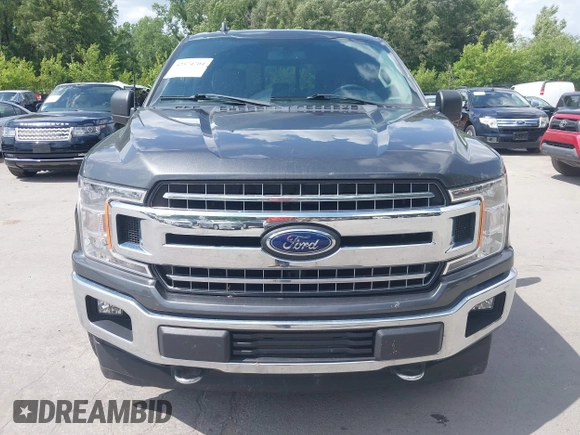 2018 Ford F-150 XL with VIN 1FTEW1E57JFA95086, listed as a IAAI auction lot 42574704 with 77,301 mi miles and . Bid and sale history available at DreamBid. Image 12.