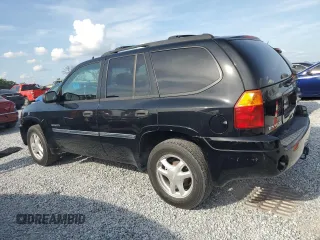 2006 GMC Envoy SLE z VIN 1GKDS13S062176000, wystawiony jako Copart lot #57672995 z przebiegiem 161 455 mil mil oraz Szkoda całkowita • Salvage title. Historia ofert i sprzedaży dostępna na DreamBid. Obrazek 2.