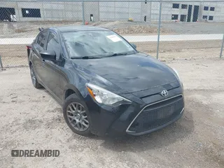 2019 Toyota Yaris L z VIN 3MYDLBYV0KY528104, wystawiony jako IAAI lot #42587002 z przebiegiem 140 066 mil mil oraz . Historia ofert i sprzedaży dostępna na DreamBid. Obrazek 1.