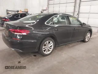 2020 Volkswagen Passat SE with VIN 1VWWA7A3XLC021477, listed as a IAAI auction lot 42473029 with 96,434 mi miles and . Bid and sale history available at DreamBid. Image 4.