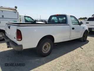1997 Ford F-150 z VIN 1FTDF1722VKA23000, wystawiony jako Copart lot #59221975 z przebiegiem 182 352 mil mil oraz Czysty tytuł • Clean title. Historia ofert i sprzedaży dostępna na DreamBid. Obrazek 3.