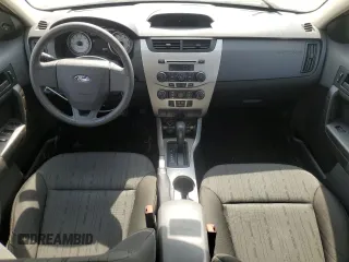 2008 Ford Focus SE z VIN 1FAHP35NX8W215744, wystawiony jako Copart lot #56096055 z przebiegiem 165 827 mil mil oraz Szkoda całkowita • Salvage title. Historia ofert i sprzedaży dostępna na DreamBid. Obrazek 8.