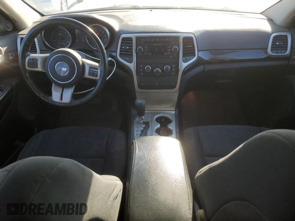 2012 Jeep Grand Cherokee Laredo with VIN 1C4RJFAG2CC267890, listed as a Copart auction lot 87832115 with 171,552 mi miles and Salvage Title. Bid and sale history available at carsss.com. Image 8.