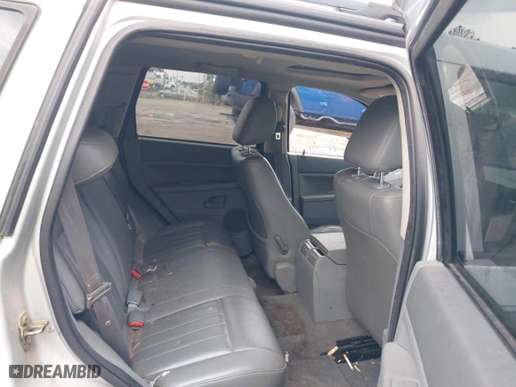 2005 Jeep Grand Cherokee Laredo with VIN 1J4GS48K75C644259, listed as a IAAI auction lot 42044878 with 250,841 mi miles. Bid and sale history available at carsss.com. Image 8.