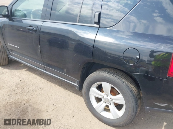 2016 Jeep Compass High Altitude with VIN 1C4NJDEB8GD647351, listed as a IAAI auction lot 41894388 with 138,356 mi miles and . Bid and sale history available at DreamBid. Image 18.