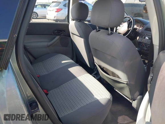 2006 Ford Focus S z VIN 1FAFP34N96W102857, wystawiony jako IAAI lot #42476971 z przebiegiem 125 744 mil mil oraz . Historia ofert i sprzedaży dostępna na DreamBid. Obrazek 8.
