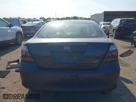 2005 Scion tC with VIN JTKDE177150041877, listed as a IAAI auction lot 41877581 with 240,179 mi miles. Bid and sale history available at carsss.com. Image 16.