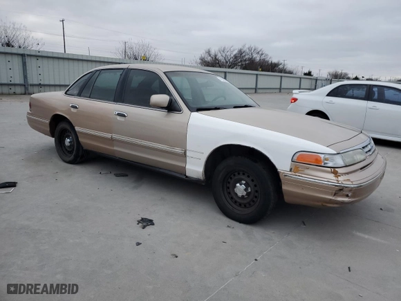 1996 Ford Crown Victoria with VIN 2FALP73W9TX212392, listed as a Copart auction lot 41832525 with 114,690 mi miles and Salvage Title. Bid and sale history available at carsss.com. Image 4.