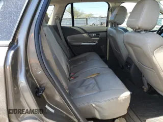 2014 Ford Edge SEL z VIN 2FMDK4JC7EBA36345, wystawiony jako Copart lot #53434145 z przebiegiem 184 955 mil mil oraz Szkoda całkowita • Salvage title. Historia ofert i sprzedaży dostępna na DreamBid. Obrazek 11.