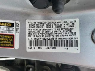 2009 Honda Civic LX z VIN 1HGFA16529L027844, wystawiony jako Copart lot #57383525 z przebiegiem 147 542 mil mil oraz Szkoda całkowita • Salvage title. Historia ofert i sprzedaży dostępna na DreamBid. Obrazek 13.