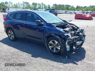 2019 Honda CR-V LX with VIN 2HKRW5H39KH400453, listed as a IAAI auction lot 40041024 with 76,932 mi miles and . Bid and sale history available at carsss.com. Image 1.