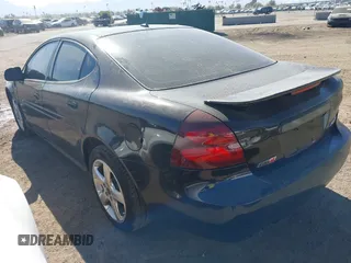 2007 Pontiac Grand Prix GXP with VIN 2G2WC58C571226261, listed as a IAAI auction lot 41487187 with 133,038 mi miles and . Bid and sale history available at DreamBid. Image 3.