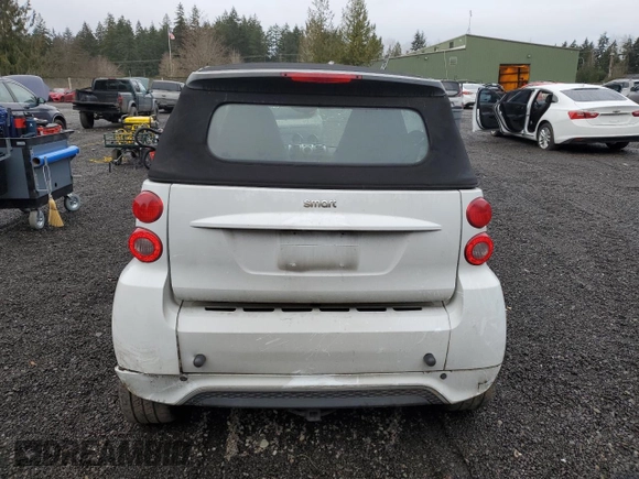 2013 Smart fortwo Passion z VIN WMEEK3BAXDK659870, wystawiony jako Copart lot #86387504 z przebiegiem 72 638 mil mil oraz Szkoda całkowita • Salvage title. Historia ofert i sprzedaży dostępna na DreamBid. Obrazek 6.
