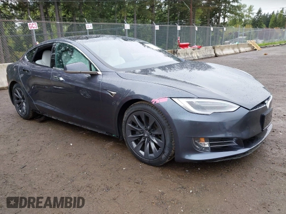 2017 Tesla Model S 100D with VIN 5YJSA1E26HF224568, listed as a IAAI auction lot 42140201 with 102,403 mi miles. Bid and sale history available at carsss.com. Image 1.