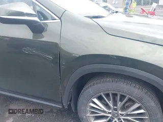 2023 Lexus NX 350h Premium with VIN 2T2GKCEZ5PC014862, listed as a IAAI auction lot 41999437 with 45,853 mi miles and . Bid and sale history available at DreamBid. Image 6.