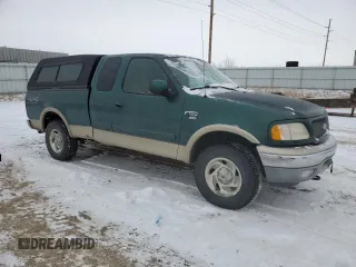 2000 Ford F-150 XL with VIN 2FTRX18L5YCB19092, listed as a Copart auction lot 43812505 with 139,503 mi miles and Salvage Title. Bid and sale history available at carsss.com. Image 4.