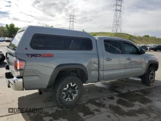 2020 Toyota Tacoma SR5 with VIN 3TMDZ5BN6LM097302, listed as a Copart auction lot 57503895 with 77,212 mi miles and Salvage title. Bid and sale history available at DreamBid. Image 3.