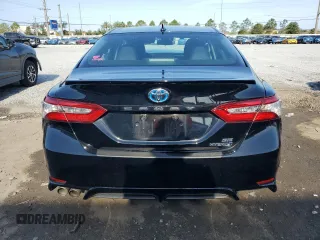 2019 Toyota Camry Hybrid LE z VIN 4T1B21HK1KU516390, wystawiony jako Copart lot #54856015 z przebiegiem 94 504 mil mil oraz Nie do naprawy • Non repairable. Historia ofert i sprzedaży dostępna na DreamBid. Obrazek 6.