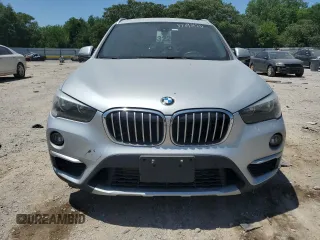 2018 BMW X1 sDrive28i z VIN WBXHU7C3XJ5H39960, wystawiony jako Copart lot #57095125 z przebiegiem 154 013 mil mil oraz Szkoda całkowita • Salvage title. Historia ofert i sprzedaży dostępna na DreamBid. Obrazek 5.
