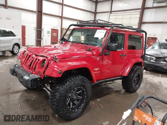2011 Jeep Wrangler Sahara with VIN 1J4AA5D10BL593534, listed as a IAAI auction lot 41551416 with 101,716 mi miles and . Bid and sale history available at DreamBid. Image 17.