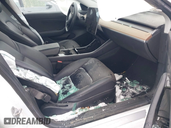 2018 Tesla Model 3 Long Range Battery with VIN 5YJ3E1EB2JF089006, listed as a IAAI auction lot 41186372 with Not Provided miles and . Bid and sale history available at DreamBid. Image 5.