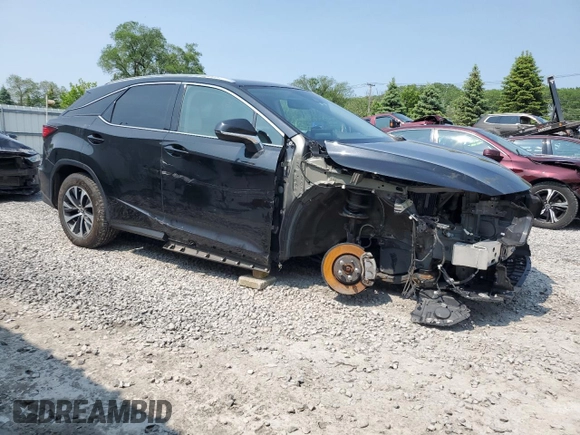 2020 Lexus RX 350 with VIN 2T2HZMDA5LC228570, listed as a Copart auction lot 60643225 with 134,118 mi miles and Salvage title. Bid and sale history available at DreamBid. Image 4.