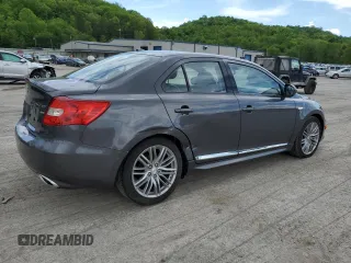 2012 Suzuki Kizashi SLS Sport z VIN JS2RF9A8XC6100015, wystawiony jako Copart lot #56905645 z przebiegiem 128 440 mil mil oraz Szkody całkowita. Historia ofert i sprzedaży dostępna na DreamBid. Obrazek 3.