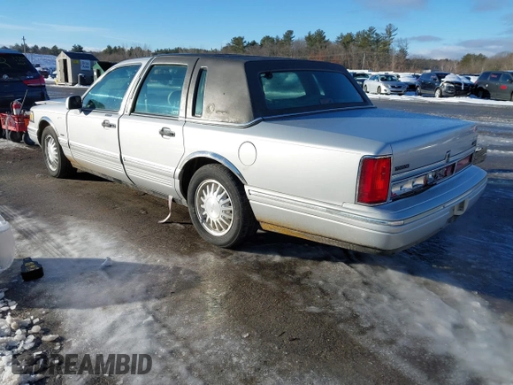 1997 Lincoln Town Car Cartier with VIN 1LNLM83W9VY661126, listed as a IAAI auction lot 41456847 with 160,710 mi miles and . Bid and sale history available at DreamBid. Image 3.