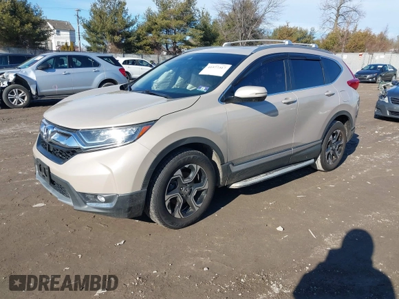 2017 Honda CR-V Touring with VIN 5J6RW2H94HL013536, listed as a IAAI auction lot 41577317 with 97,132 mi miles. Bid and sale history available at carsss.com. Image 18.