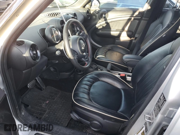 2015 MINI Countryman John Cooper Works with VIN WMWXD1C53FWS34815, listed as a Copart auction lot 74667224 with 94,971 mi miles and Salvage Title. Bid and sale history available at DreamBid. Image 7.