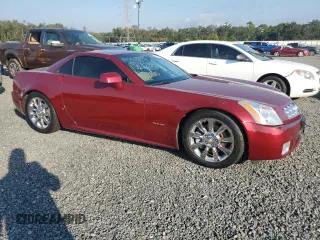 2006 Cadillac XLR z VIN 1G6YV36A465601366, wystawiony jako Copart lot #76229944 z przebiegiem 33 159 mil mil oraz Nie do naprawy. Historia ofert i sprzedaży dostępna na DreamBid. Obrazek 4.