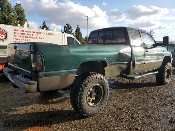 2001 Dodge Ram 2500 with VIN 1B7KF23621J511711, listed as a Copart auction lot 80985474 with 290,639 mi miles and Salvage Title. Bid and sale history available at carsss.com. Image 3.