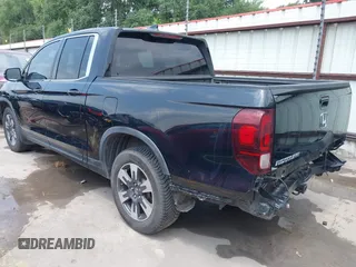 2017 Honda Ridgeline RTL z VIN 5FPYK2F55HB011463, wystawiony jako IAAI lot #42139030 z przebiegiem 59 066 mil mil oraz . Historia ofert i sprzedaży dostępna na DreamBid. Obrazek 3.