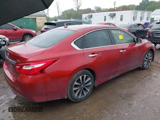 2016 Nissan Altima SV with VIN 1N4AL3AP8GC152650, listed as a IAAI auction lot 40471606 with 146,602 mi miles and . Bid and sale history available at DreamBid. Image 4.