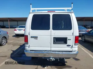 2014 Ford Econoline Passenger XL with VIN 1FBNE3BL7EDA37146, listed as a IAAI auction lot 41871526 with 139,387 mi miles. Bid and sale history available at carsss.com. Image 17.