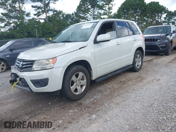2013 Suzuki Grand Vitara Premium with VIN JS3TE0D68D4100201, listed as a IAAI auction lot 42694457 with 126,585 mi miles and . Bid and sale history available at DreamBid. Image 2.