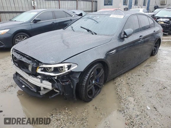 2014 BMW M5 with VIN WBSFV9C5XED593740, listed as a Copart auction lot 45210415 with 76,583 mi miles and Clean Title. Bid and sale history available at carsss.com. Image 1.