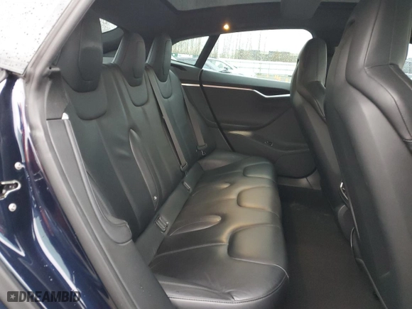 2014 Tesla Model S P85D with VIN 5YJSA1H29EFP62480, listed as a Copart auction lot 49725535 with 102879 miles and Salvage Title. Bid and sale history available at carsss.com. Image 10.