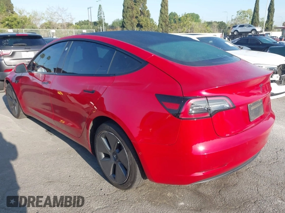 2021 Tesla Model 3 Long Range with VIN 5YJ3E1EB1MF071634, listed as a IAAI auction lot 41964321 with 39,596 mi miles. Bid and sale history available at carsss.com. Image 3.
