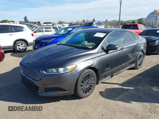 2015 Ford Fusion S Hybrid with VIN 3FA6P0UU2FR105754, listed as a IAAI auction lot 41631104 with 185,114 mi miles. Bid and sale history available at carsss.com. Image 2.