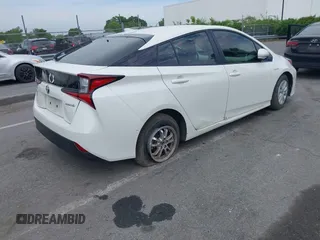 2019 Toyota Prius L Eco z VIN JTDKARFU3K3102222, wystawiony jako IAAI lot #42291403 z przebiegiem 27 669 mil mil oraz . Historia ofert i sprzedaży dostępna na DreamBid. Obrazek 4.