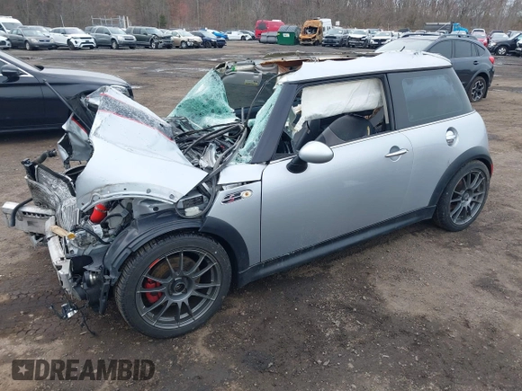 2006 MINI Hardtop S with VIN WMWRE33546TL23876, listed as a IAAI auction lot 41858060 with 146,359 mi miles and . Bid and sale history available at DreamBid. Image 18.