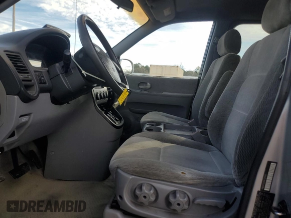 2005 Kia Sedona LX with VIN KNDUP132X56721558, listed as a Copart auction lot 88574685 with 176,660 mi miles and Salvage Title. Bid and sale history available at carsss.com. Image 7.