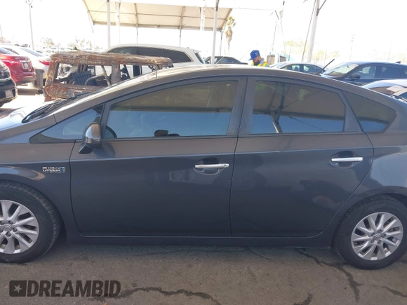 2012 Toyota Prius with VIN JTDKN3DP4C3024744, listed as a IAAI auction lot 41824675 with 107,837 mi miles and . Bid and sale history available at DreamBid. Image 14.