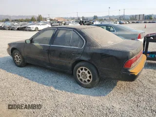 1992 Nissan Maxima z VIN JN1HJ01F1NT007180, wystawiony jako Copart lot #71271334 z przebiegiem 252 299 mil mil oraz Tytuł czysty. Historia ofert i sprzedaży dostępna na DreamBid. Obrazek 2.